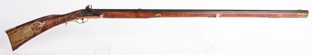 QUALITY CUSTOM FULL STOCK FLINTLOCK KY. RIFLE: BARREL 41". CALIBER .45. Unsigned custom rifle with full octagon barrel, full length stock, single trigger, brass patch box, brass furniture, antiqued iron barrel and hardware. Some nice carving and a