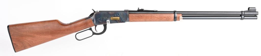BOXED WINCHESTER MODEL 1894 CARBINE ANTIQUE FINISH: SERIAL 4998666. BARREL 20". CALIBER 30-30. Offered with "Antiqued" finish, frame is purposely striped with patina / blue and is lightly engraved. Barrel and tube are blue with two rings, walnut stock,