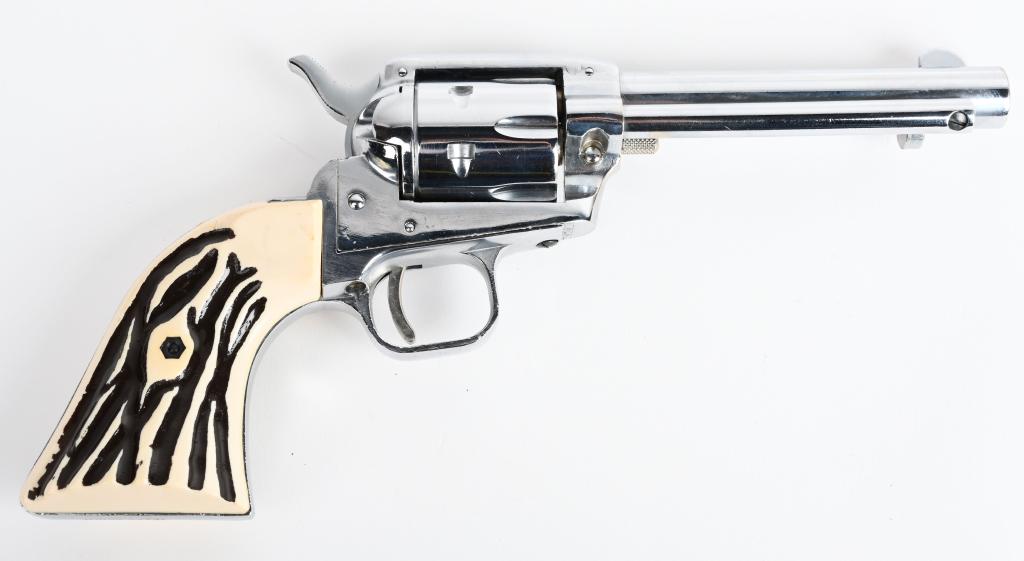 GERMAN TEXAS SCOUT SA .22 REVOLVER: SERIAL 170262. BARREL 4 3/4". CALIBER .22 LONG RIFLE. Copy of small Colt Frontier .22 six shot single action revolver. Features chrome finish, faux stag grips with fixed sights. Butt is stamped Texas