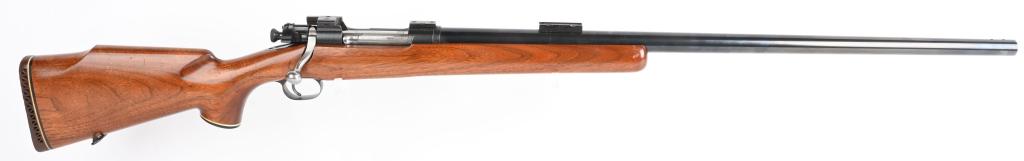 CUSTOM US SPRINGFIELD 1903 HEAVY BARREL RIFLE: SERIAL 3607867. BARREL 28". CALIBER 308 Norma Magnum (verified) . The standard US Model 1903 action was used including a scooped bolt fit for scope that a heavy custom round barrel was added that lack