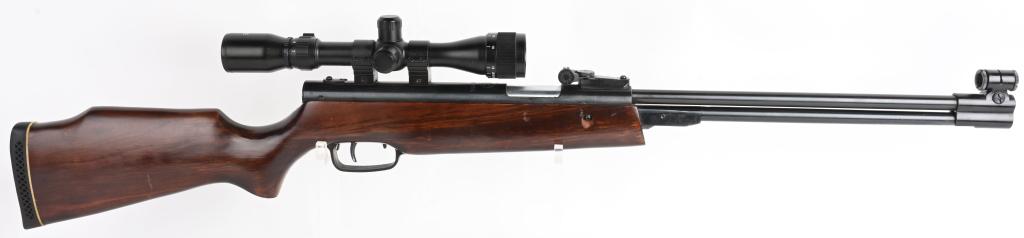 NORINCO TARGET .177 AIR RIFLE WITH SCOPE: Features pistol grip hardwood stock with pad, target sights, blue finish with Tech Force scope. Excellent condition A