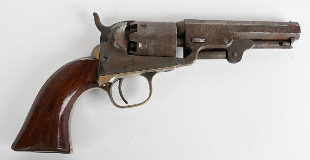 COLT MODEL 1849 POCKET REVOLVER: SERIAL 207000. BARREL 4". CALIBER .31. MADE IN 1862. Matching numbers but cannot read cylinder. Parts of cylinder scene and most legends readable but this gun has no finish, has scattered pitting, nic