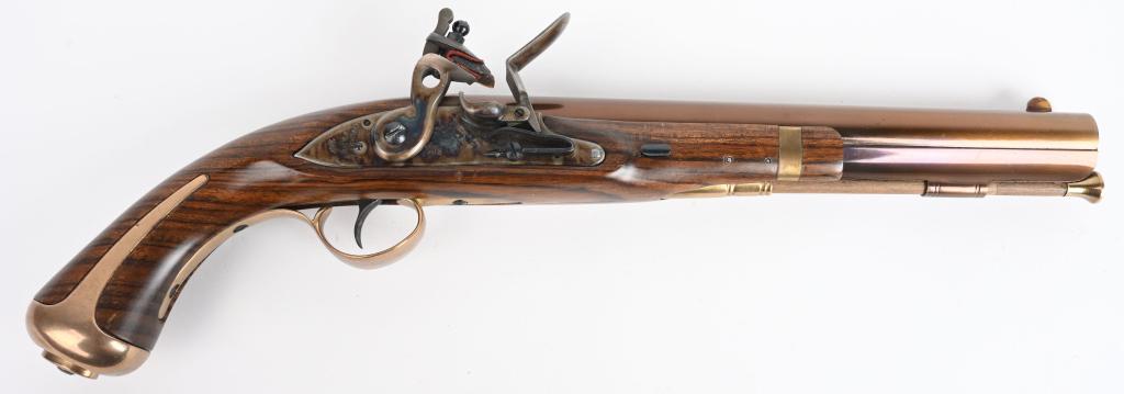 US 1807 REPLICA HARPERS FERRY FLINTLOCK PISTOL: SERIAL 48155. BARREL 9 3/4". CALIBER .60 RIFLED. Fine Italian replica of one of the most graceful of all US pistols. Beautifully finished barrel and furniture in antique bronze with case color hardwar