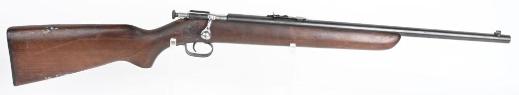 WINCHESTER MODEL 67 .22 CALIBER BOLT ACTION RIFLE: *(NO SERIAL NUMBER -- MADE PRIOR TO NFA)* 20" barrel bolt action rifle in .22 caliber. Winchester Model 67. Features wood stock, fixed front sights, adjustable rear sight, and blued finish. Functions 