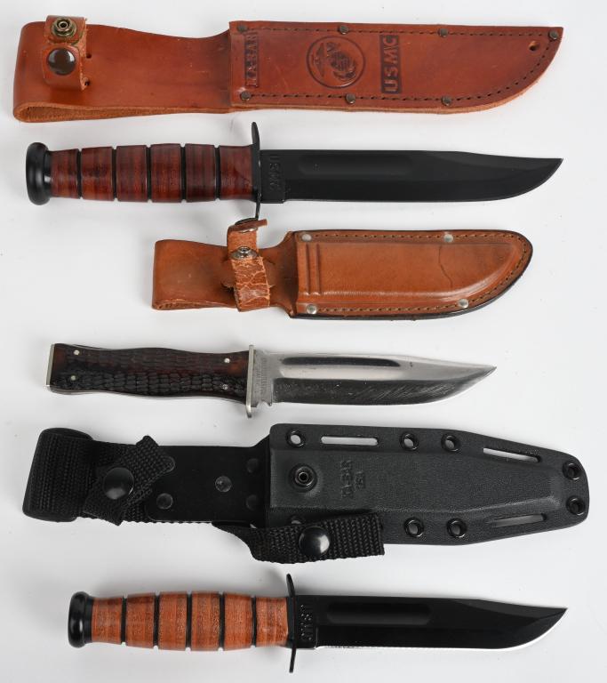 LOT (3) KA-BAR KNIVES: A. USMC in sheath stamped with Corp emblem Blade stamped USMC & KA BAR OLEAN NY. Has blood groove, black phosphate finish, drop point 7" blade. Leather handle with pommel totals 12". Near mint. B. USM