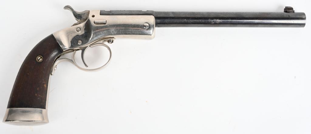 STEVENS NO. 35 TARGET PISTOL: SERIAL 31575. BARREL 8". CALIBER .22. Barrel reblued, no rear sight, frame re-nickeled, walnut grips very good. bore dirty. release pin replaced, barrel does not lock into place. C&R As is for parts o