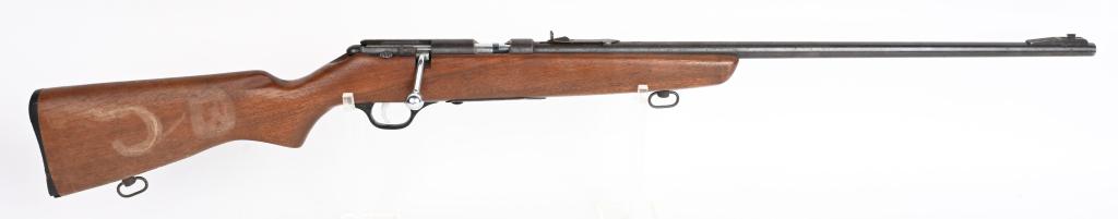 MARLIN MODEL 80 BOLT ACTON .22 RIFLE: Appears complete but no magazine. Metal is freckled blue. Bore very good. Stock is fine but large J carved on left side. This gun could be refinished and would be a good shooter as bore is very good. 