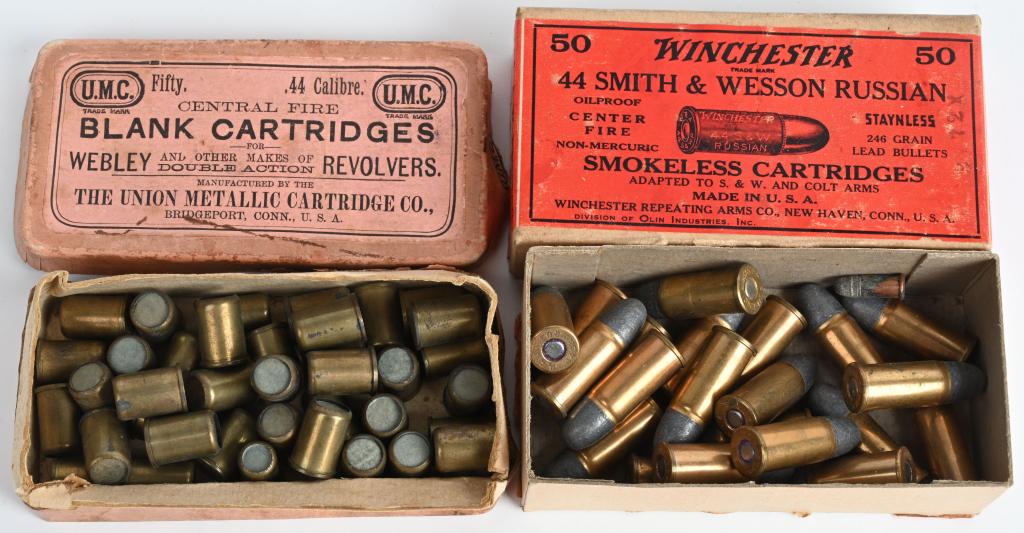 TWO SCARCE BOXES ANTIQUE .44 CALIBER AMMO: A. UMC BOX of .44 blank cartridges for the Webley double action revolver. 38 very clean rounds in pink two piece box. B. Winchester red label box .44 Smith & Wesson Russian. Two piece box with 21 clea