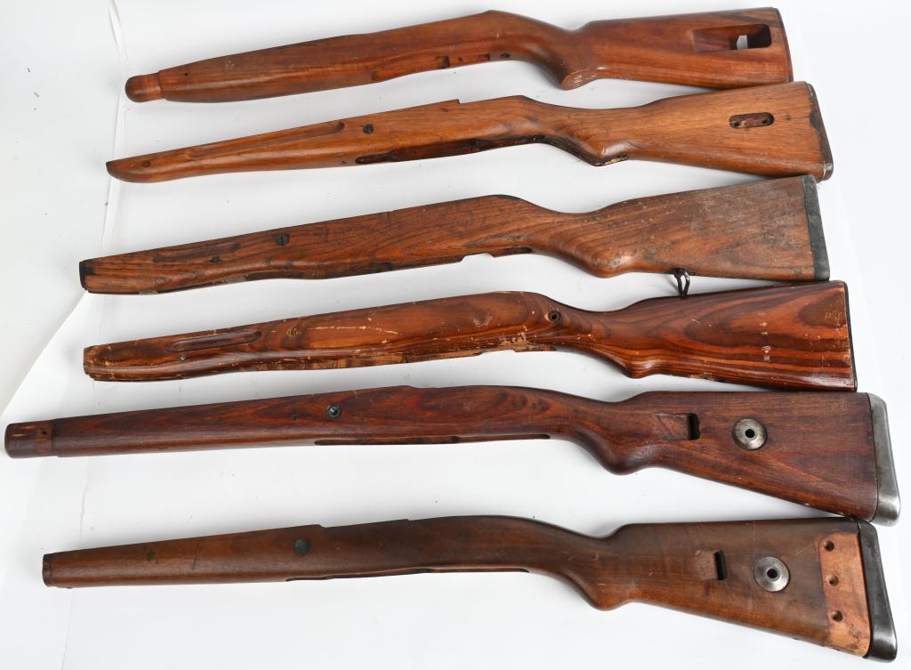 6 MILITARY RIFLE STOCKS SKS MAUSER M1 CARBINE: Lot of 6 wooden military rifle stocks including a "DPD" marked M1 Carbine stock, two Mauser stocks, two SKS stocks, and one Mosin Nagant stock. Perfect for restoration. All show service wear and age. 