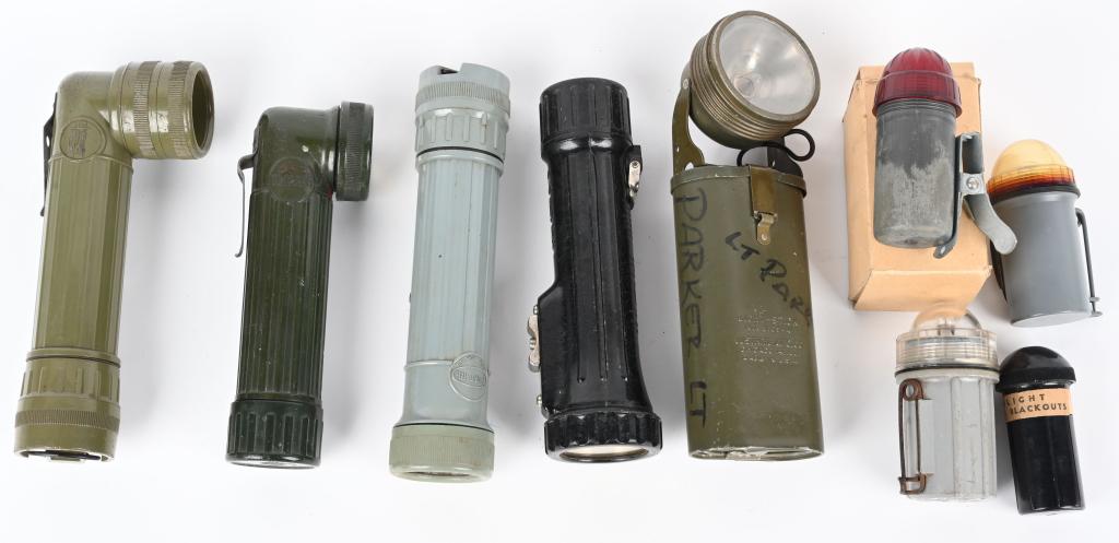 WWII US MILITARY FLASHLIGHT LOT OF 9 WW2 ARMY NAVY: Military flashlight lot to include 1) Light Stick No. 2105-4 Justrite Mfg. Co. Chicago 14. Ill. Made in the USA named to Lt. Parker to the outside 2) Department of the Interior Bureau of Mines marked