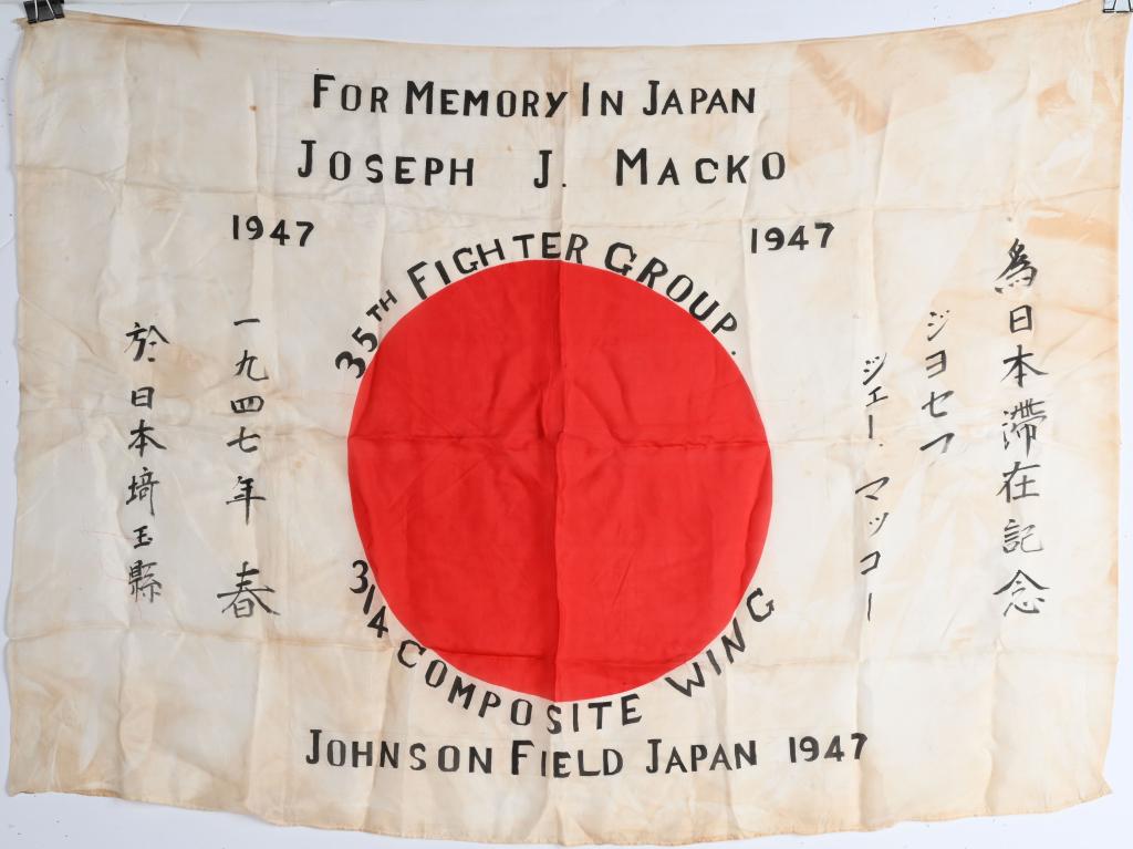 WWII JAPANESE OCCUPATION 35th FIGHTER GROUP FLAG: 1947 Japanese Occupation national flag nicely inked to the 35th Fighter Group of the 314th Composite Wing Johnson Field Japan. Flag measures 38 X 28 inches and is named to Joseph J. Macko in remembran