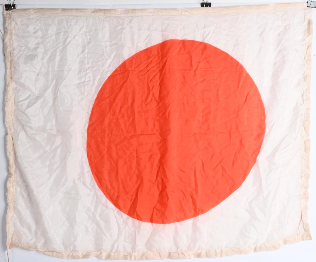 WWII JAPANESE SILK NATIONAL FLAG W/ FLOAT BORDER: Nice original WWII silk Japanese aviation float flag measuring about 37" by 30" with an unusual small float border around the flag with the original ties. Excellent. Before Pearl Harbor, the Japanese 