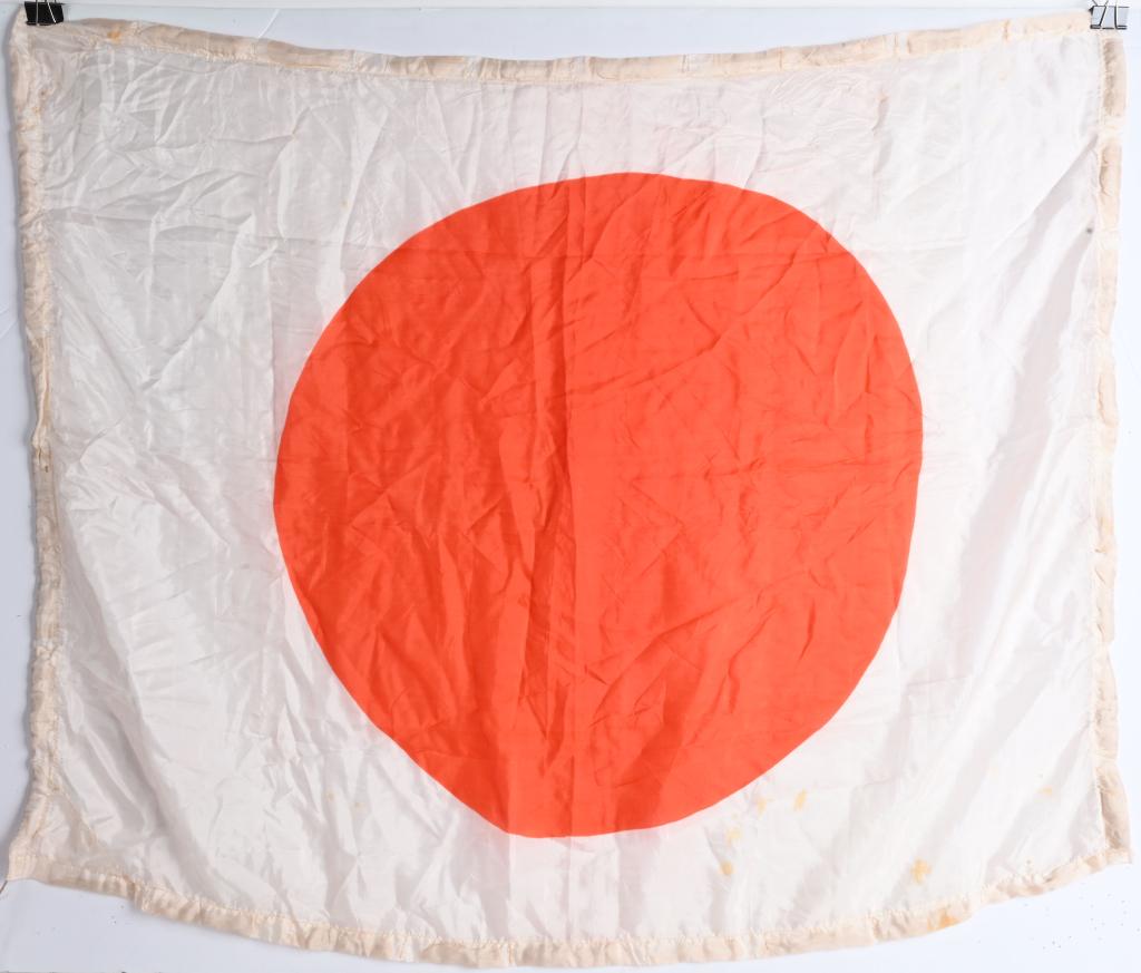 WWII JAPANESE SILK NATIONAL FLAG W/ FLOAT BORDER: Nice original WWII silk Japanese aviation float flag measuring about 40" by 31" with an unusual small float border around the flag with the original ties. Excellent. Before Pearl Harbor, the Japanese 