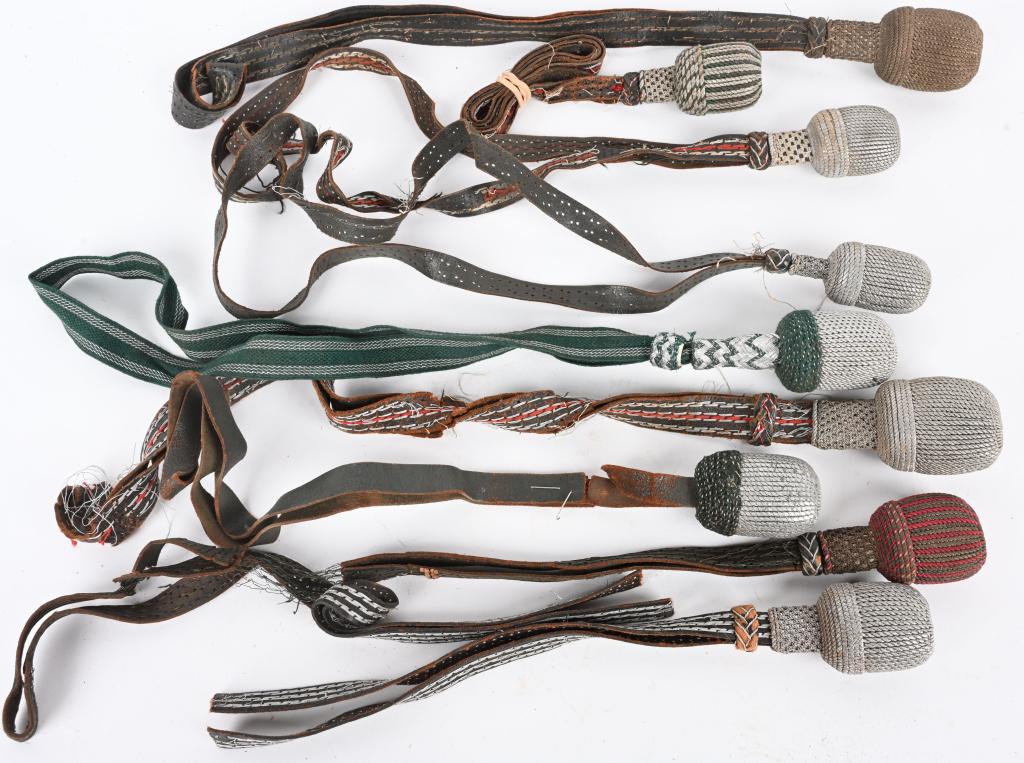 9 WWII NAZI GERMAN DAGGER, BAYONET, SWORD KNOTS: Lot of 9 WWII Nazi German sword knots. Condition and color varies. Very Good - Excellent