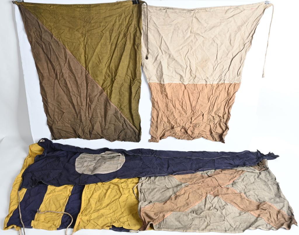 WWII JAPANESE NAVY SIGNAL FLAGS LOT OF 6 IJN WW2: WWII Japanese Navy Ships signal flags grouping of six different flags are weathered but still in very good condition. The flags after going a google check means the white with red cross represents V. 