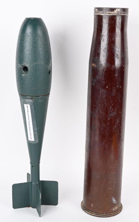 ARTILLERY SHELL CASING + PRACTICE BOMB: M1951 90mm Artillery Shell casing and MK76 Model 5 81mm Practice bomb. Both inert. Shell casing measures approximately 2ft tall and practice bomb is approximately 2 ft long. Both show wear and age. Ve