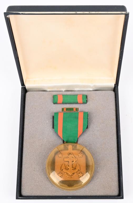 US NAVY ACHIEVEMENT MEDAL CASED w RIBBON LAPEL PIN: Navy Achievement Medal cased for junior officers and enlisted men where professional achievement exceeds normal expectancy. Excellent