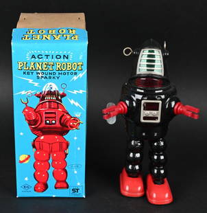 KO TIN WINDUP PLANET ROBOT w/ BOX: Yoshiya tin windup Planet Robot. Made in Japan. All original and complete. Looks never played with. Windup works and still sparks. With original box. 9" Excellent