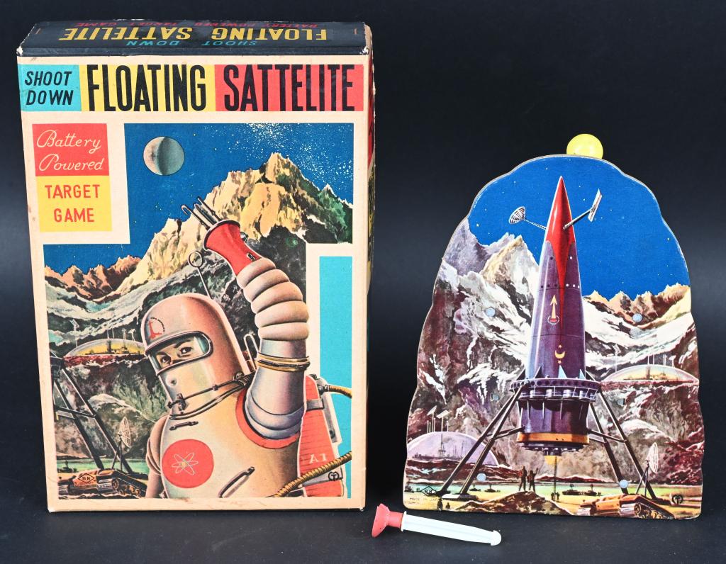 SH BATTERY OP FLOATING SATELLITE TARGET GAME w/BOX: Horikawa battery operated Floating Satellite Target Game. Made in Japan. All original and worked when tested. Set is missing gun. Boxed with insert. Box has great graphics. 10 1/2" Excellent