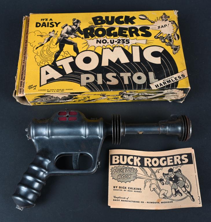 DAISY BUCK ROGERS DISINTEGRATOR PISTOL w/ BOX: Daisy Buck Rogers Disintegrator Pistol. Made in the USA. Bare metal finish version. All original and complete. Pop action still works. Comes with scarce original box with end flaps. 10" Excellent