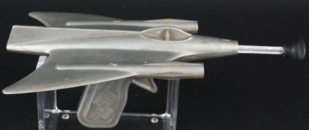 SUPERIOR ROCKET DART GUN: Superior Rocket Dart Gun. Made in the USA. All original and complete. Action needs some adjustment. 8" Excellent