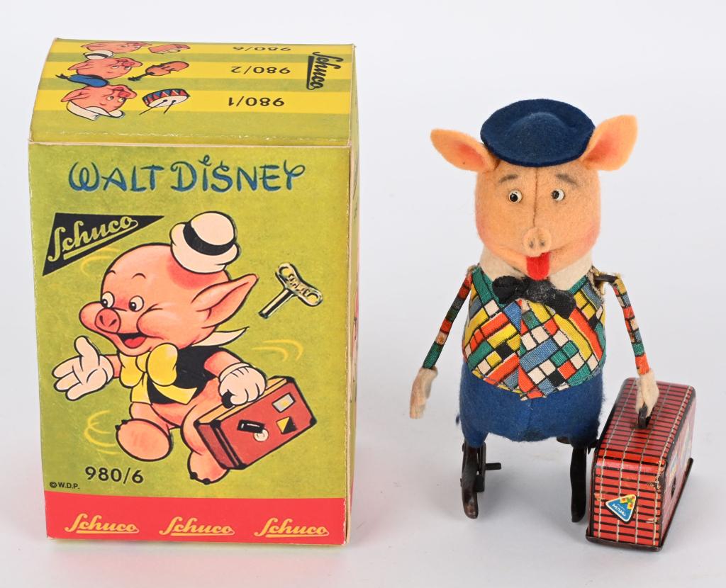 SCHUCO WINDUP WALT DISNEY PIG & SUITCASE (1 of 8)