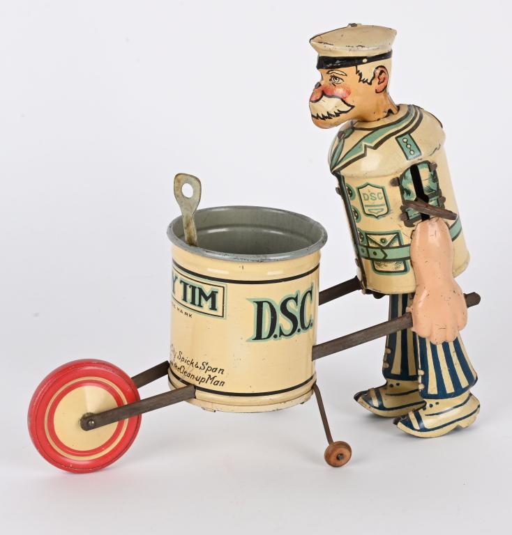 MARX TIN WINDUP TIDY TIM STREET SWEEPER: Marx tin windup Tidy Tim Street Sweeper. All original and complete. Nice colors. Comes with shovel. Windup works. 9" Excellent