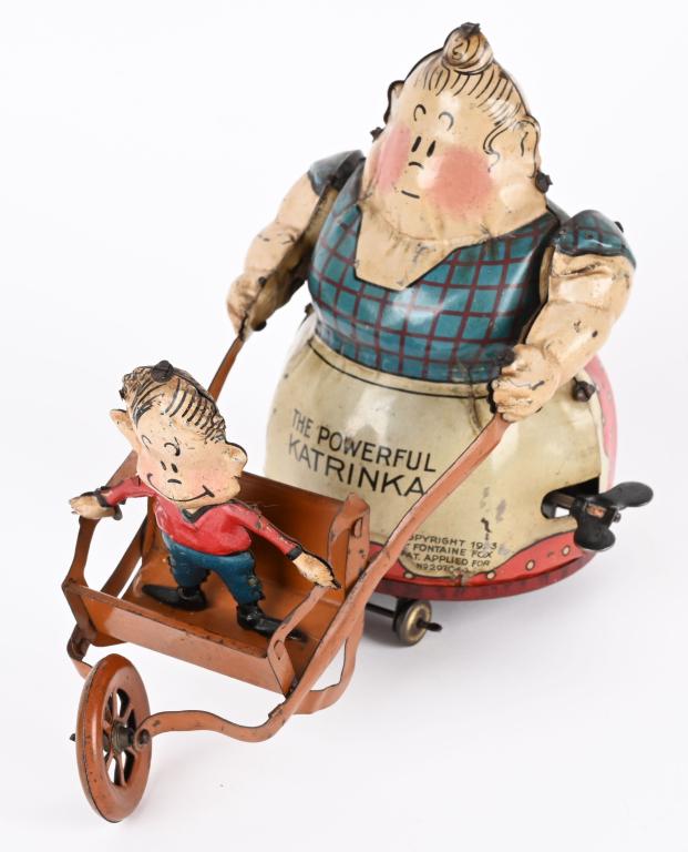 NIFTY TIN WINDUP POWERFUL KATRINKA & JIMMY (1 of 4)
