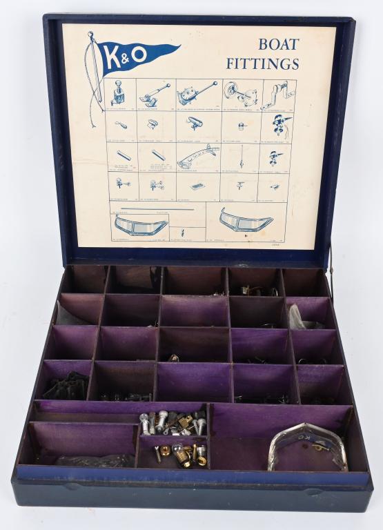 K&O BOAT FITTINGS w/ CASE: K&O factory box with Boat Fittings. Large selection of lights, hood ornaments, cleats, rudders, steering wheels, and more. All in factory box. Huge collection of original parts. 13" Excellent