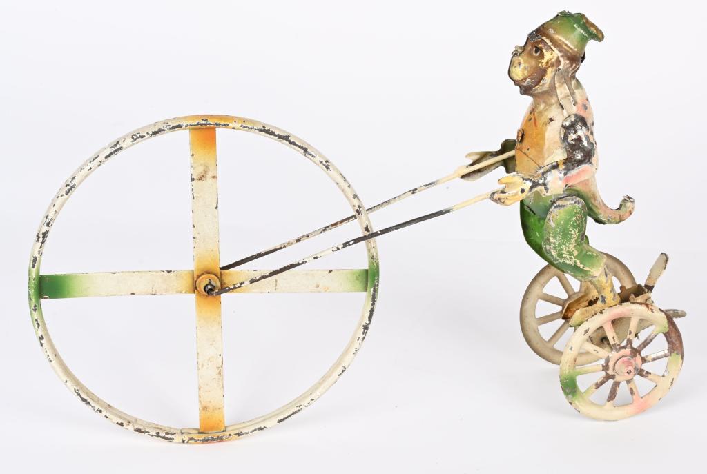GERMAN HAND PAINTED TIN WINDUP MONKEY w/ WHEEL (1 of 5)