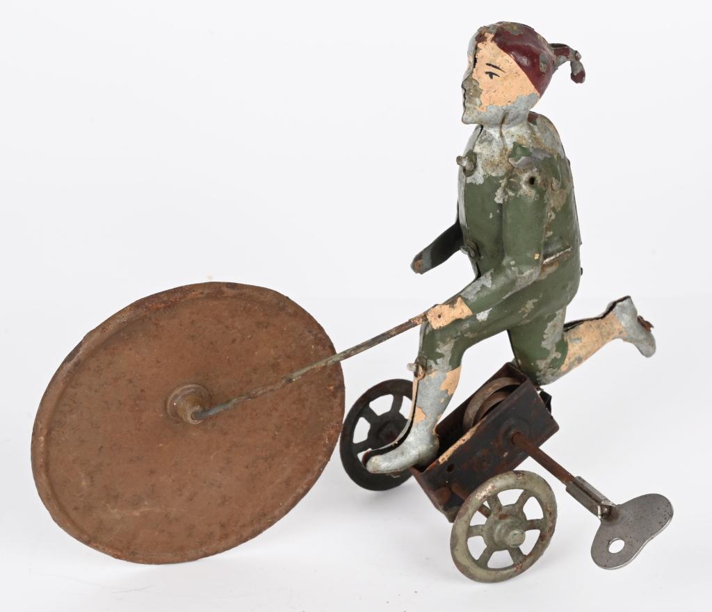 GERMAN HAND PAINTED TIN WINDUP BOY & WHEEL (1 of 4)