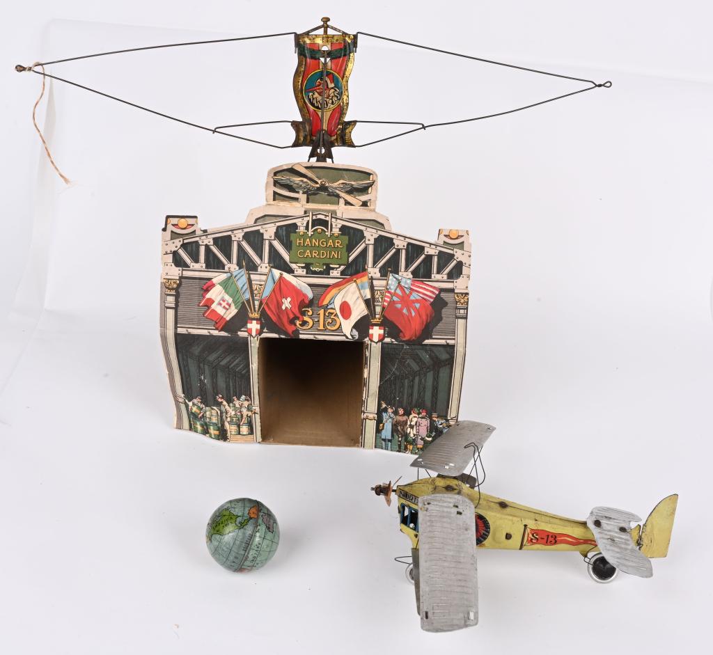 ITALY TIN WINDUP CARDINI HANGER WITH AIRPLANE (1 of 13)