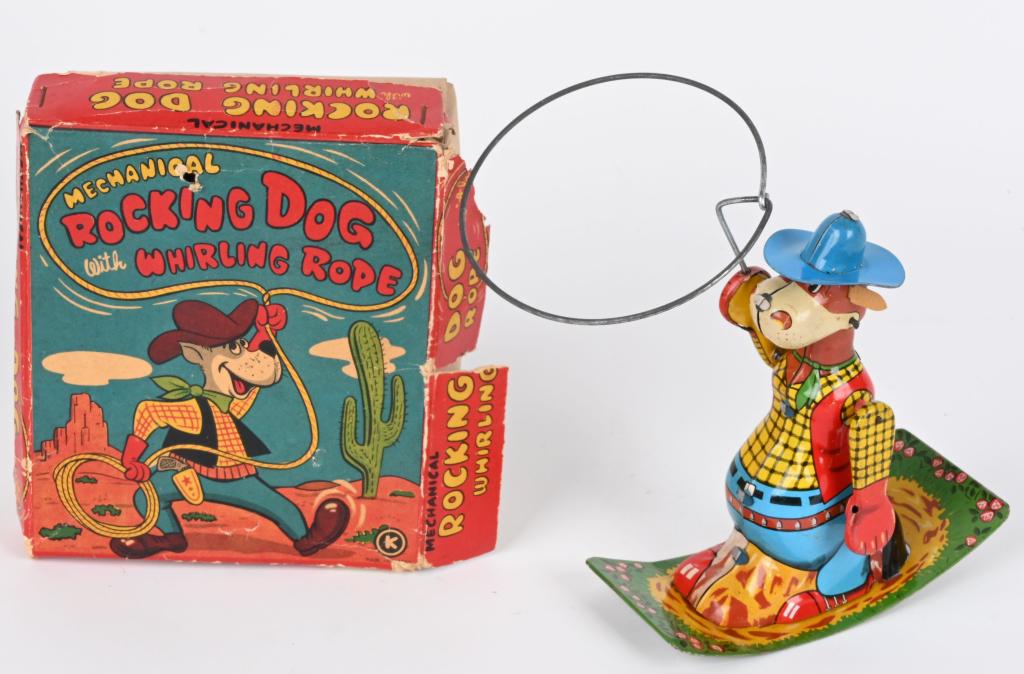 JAPAN TIN WINDUP ROCKING DOG WHIRLING ROPE w/ BOX: Japan tin windup Rocking Dog Whirling Rope. All original with nice colors. Windup works. Boxed. 6" Excellent