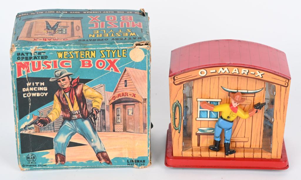 LINEMAR WESTERN STYLE MUSIC BOX w/ BOX: Linemar battery operated Western Style Music Box with Dancing Cowboy. All original and complete. Worked and played music when tested. Boxed. 6" Excellent