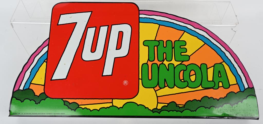 7UP THE UNCOLA TIN RAINBOW SIGN: Nice original 7up The Uncola tin Rainbow Sign. Has great colors. Made by Stout Signs. 24"x12" Excellent