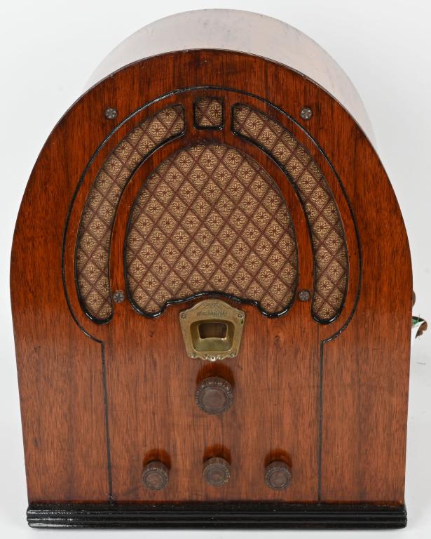 PHILCO TYPE 60 CATHEDRAL TUBE RADIO: Philco type 60 Cathedral style radio. Case is nicely refinished. When plugged in the dial lit up and there was static. The speaker is loose inside. 16", Very Good-Excellent