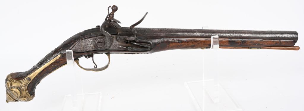 ANTIQUE MID-EAST FLINTLOCK CHIEF'S PISTOL: Great looking all original Mid Eastern flintlock pistol. It is in original flint configuration. Stock has the typical carving And silver wire inlay often seen on these pistols. Action does not work we