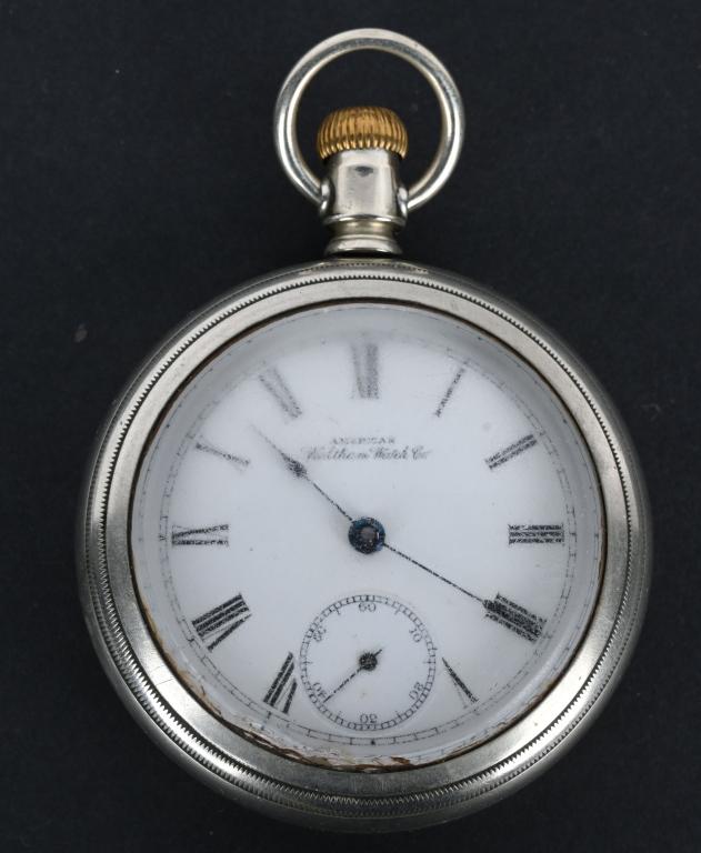 WALTHAM 1892, NO. 1 POCKET WATCH 18S, 7 J: Nice original Waltham pocket watch, size 18 with 7 jewels. Housed in a coin silver swing out case. Model 1883 made in 1892. Worked when tested. Some chipping to edge of crystal. Very Good-Excellent