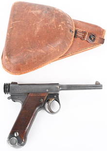 WW2 JAPANESE TYPE 14 NAMBU WITH HOLSTER: SERIAL NUMBER 57749 BARREL 4-5/8" CALIBER 8MM NAMBU MANUFACTURED 1939. Produced at Nagoya arsenal in 1939 (last year for small guard) with blue finish and grooved wood grip panels. Dated 14.3 (March
