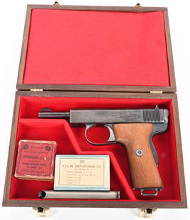 RARE 9MM WEBLEY AUTOMATIC PISTOL WITH AMMO: SERIAL NUMBER 116550 BARREL 4-7/8" CALIBER 9MM BROWNING LONG MANUFACTURED 1909. Produced in very limited quantities and fitted with grooved wood stocks and with a high polish blue. Detachable 8 round