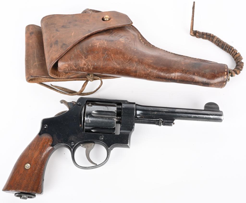 WW1 SMITH & WESSON MODEL 1917 REVOLVER W/ HOLSTER: SERIAL NUMBER 50373 BARREL 5-1/2" CALIBER .45 ACP MANUFACTURED 1918. Produced by Smith & Wesson and chambered for the .45 acp cartridge and intended for use with 1/2 moon clips. finished in commercial