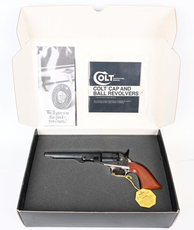 NIB COLT 2ND GEN. MODEL 1862 POCKET NAVY REVOLVER: SERIAL 56263. BARREL 5.5". CALIBER .36. Features octagon barrel, rebated stage coach scene, blue & case color, silver plated back strap & trigger guard, one piece walnut grips, five shot. Unfired in b