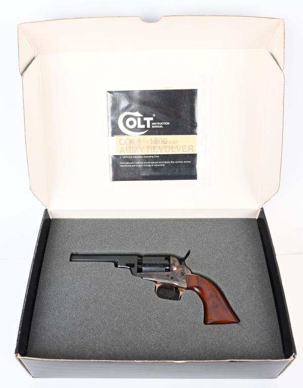 NIB COLT 2ND GEN. BABY DRAGOON REVOLVER: SERIAL 16822. BARREL 4". CALIBER .31. Features octagon barrel, no loading rod, blue & case color finish, one piece walnut grips, silver plated square back trigger guard & back strap, oval notches. Unf