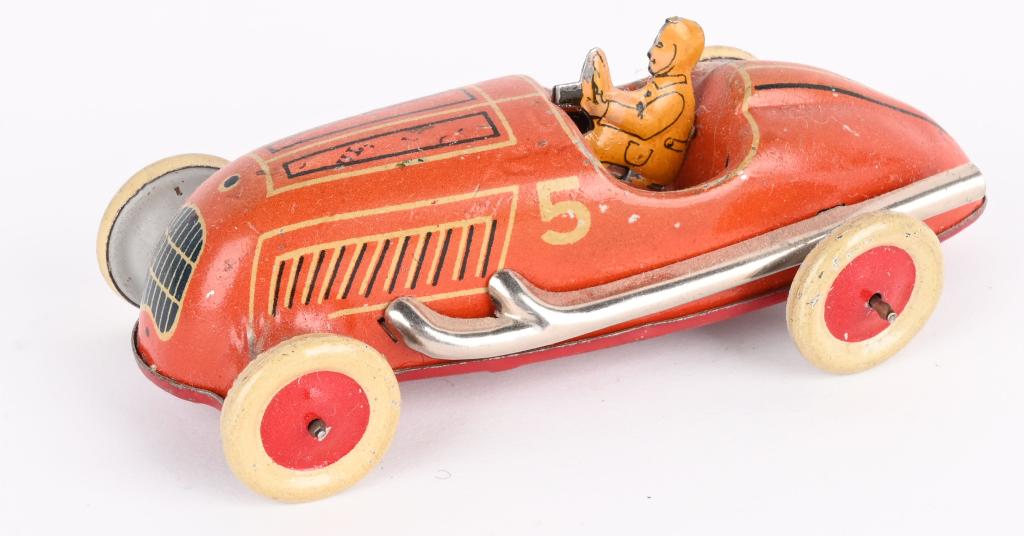 GERMAN PENNY TOY TIN BOAT TAIL RACER (1 of 4)