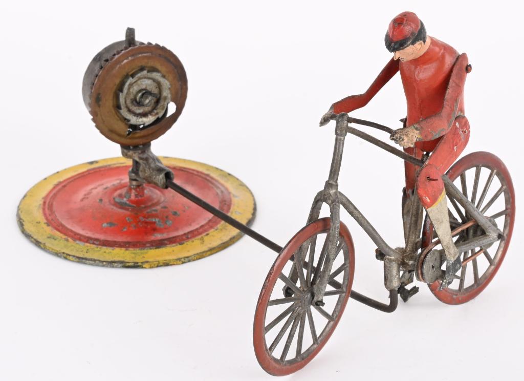 FRENCH WINDUP BICYCLE GO-ROUND (1 of 5)