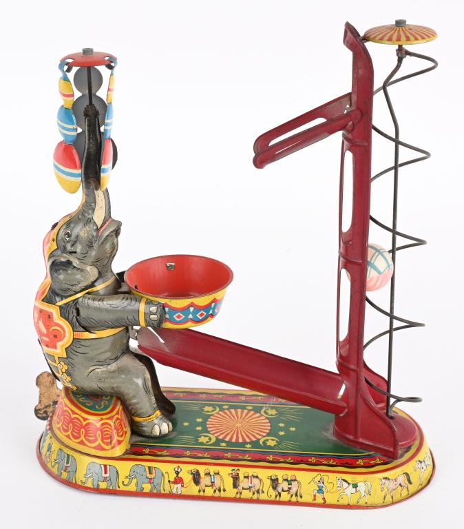 GERMAN TIN WINDUP ELEPHANT BALL TOY (1 of 4)