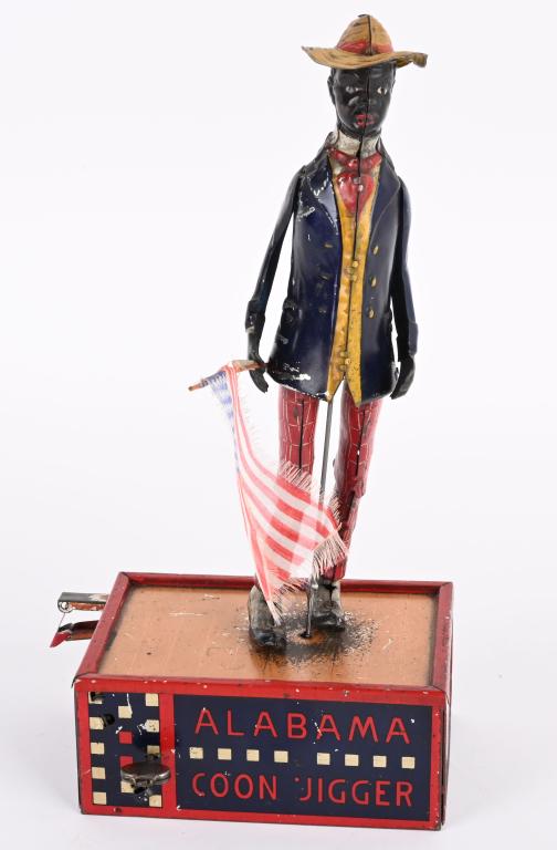 LEHMANN TIN WINDUP HO-MY COON JIGGER: Lehmann tin windup Oh-My Coon JIgger. All original with very nice colors. Arms are original. Base has normal loss where feet hit. Windup works. Americn flag has been added. 10" Excelelnt