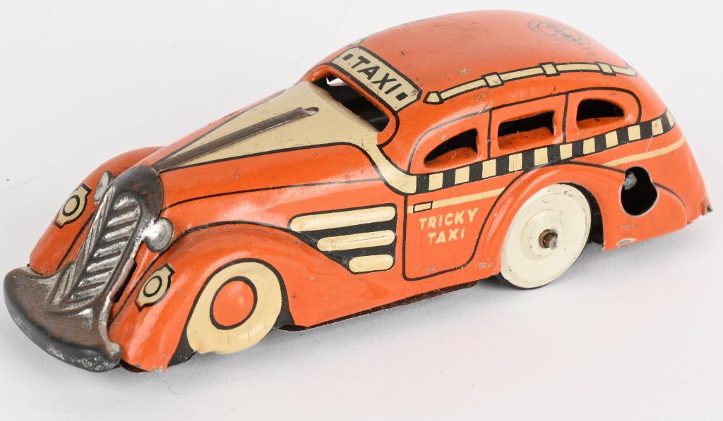 MARX TIN WINDUP TRICKY TAXI (1 of 3)
