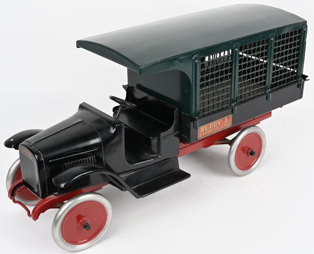 BUDDY L PRESSED STEEL EXPRESS LINE TRUCK: Professionally restored Buddy L Express line Truck. Very well done with a very original look to the truck. Front cab is loose but truck still displays perfect. 25" Excellent