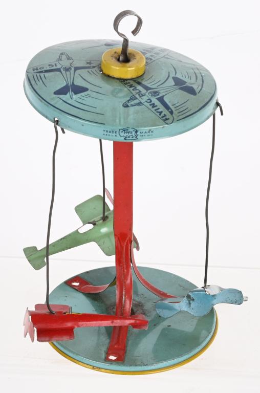 TIN WINDUP FLYING PLANES TOY (1 of 4)